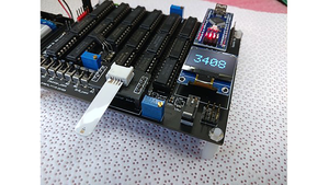 Cerebrospinal fluid detection in action showing inserted sensor strip and 4-digit readout