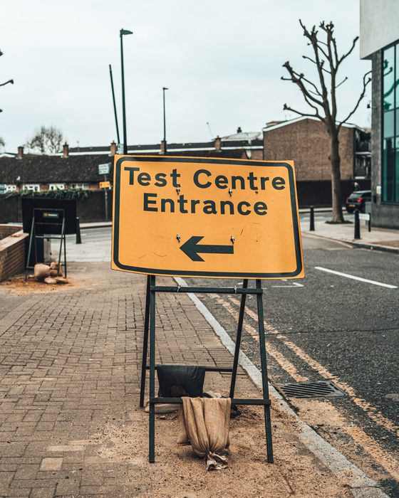 Sign to a COVID-19 test center in the U.K.