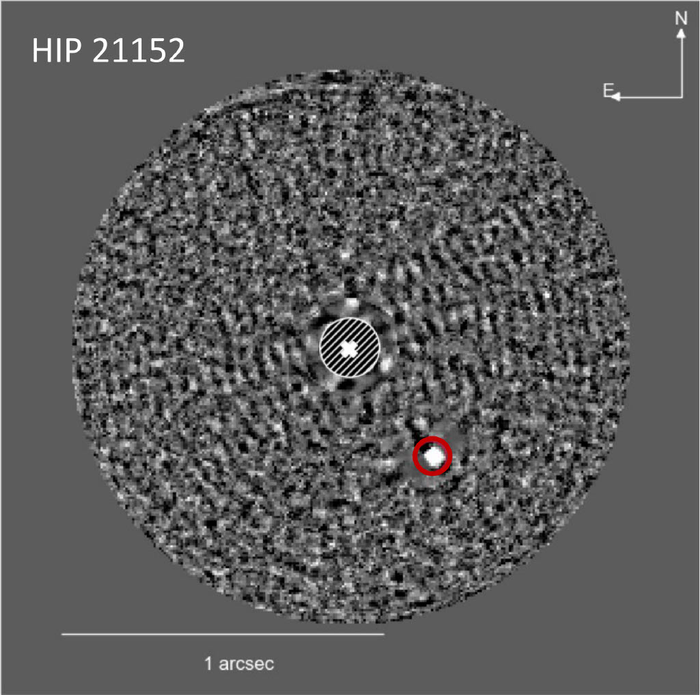 Image of the brown dwarf (in the red circle) discovered around the star HIP 21152, obtained with the Very Large Telescope SPHERE instrument