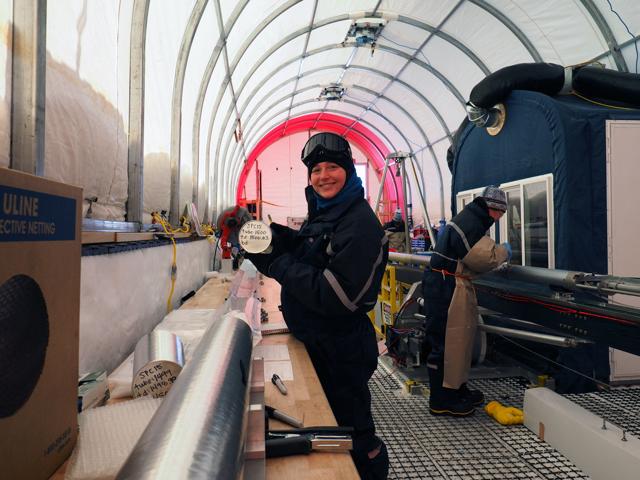 Researcher with ice core