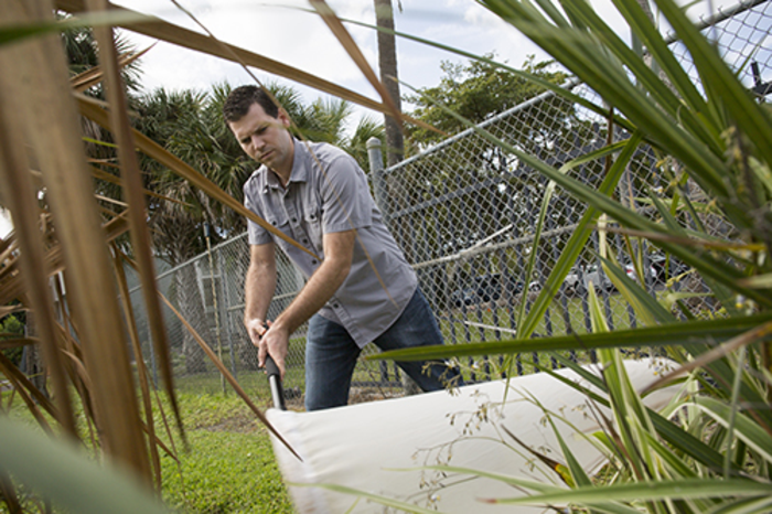 Brian W. Bahder doing fieldwork