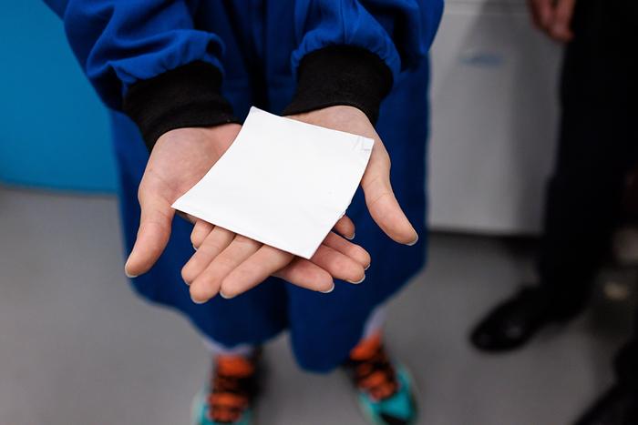 Spectrally engineered textile for radiative cooling against urban heat islands