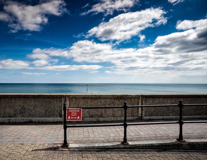 Boardwalk with COVID-19 sign