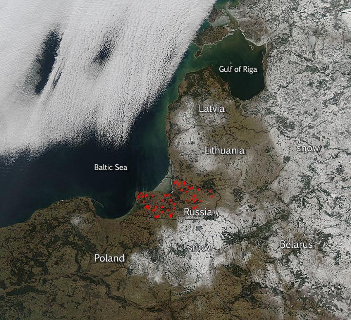 Aqua Image of Fires and Snow in Central Europe