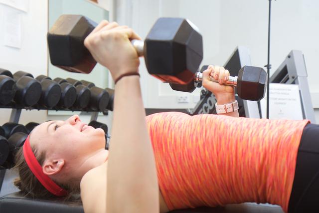 Woman lifting weights