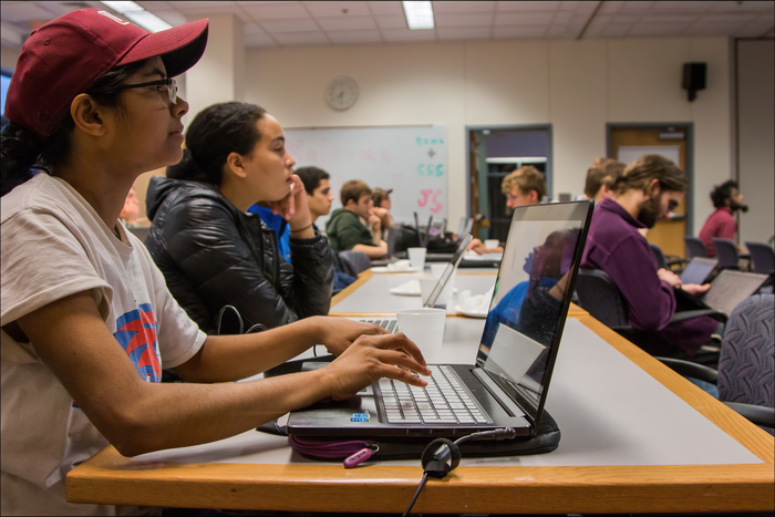 Students at the UMass Manning College of Information and Computer Science preparing for the HackUMass hackathon.