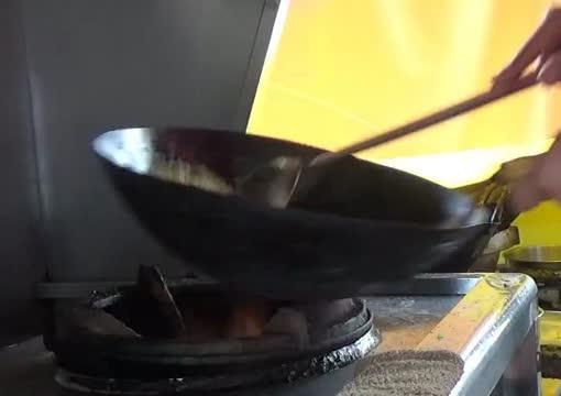 Fried Rice Being Cooked in a Wok During a Five-second Interval