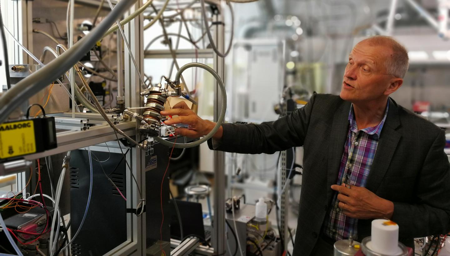 Professor Esko Kauppinen with the Fabrication Reactor