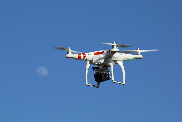 UAVs or drones and mobile robots can provide many services in smart cities