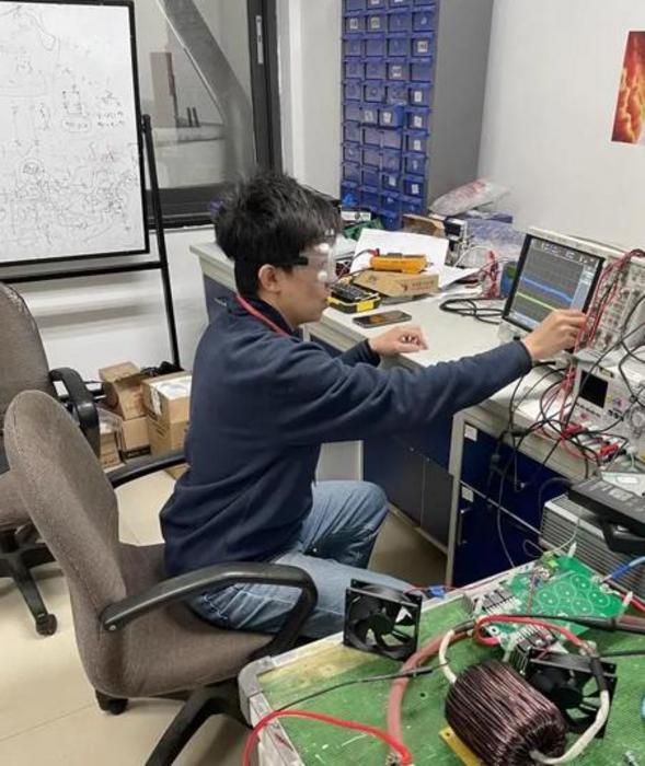 Professor Ning conducting experiments at the Institute of Electrical Engineering, Chinese Academy of Sciences (IEE CAS)