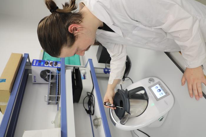 Valerii A. Shiriaev, a member of the research team, working in the lab