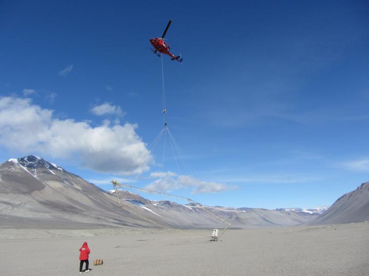 Helicopter with Electromagnetic Sensor Surveys Antartica's Groundwater