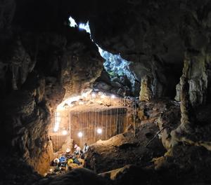 Local archaeologists excavating in the Tam Pà Ling cave, Laos