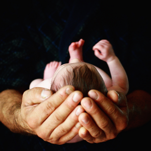 A baby being held.