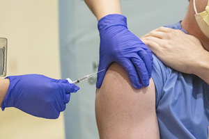 Person getting COVID vaccine