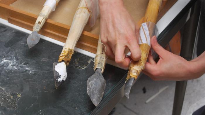 Examples of experimental thrusting spears and javelins armed with replicas of the archaeological flint points.