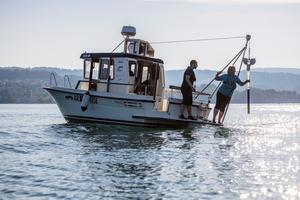 Nathalie Dubois collecting sediment sample