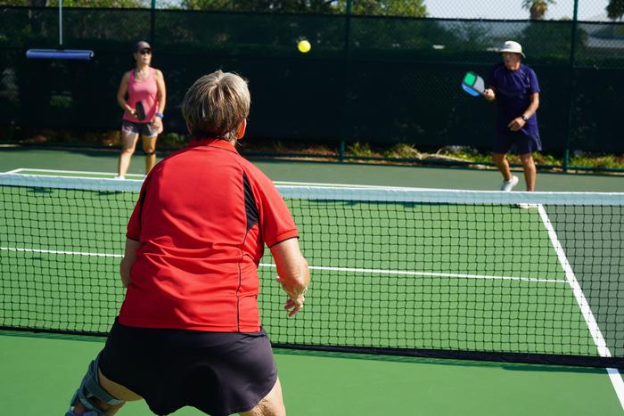 People playing pickleball