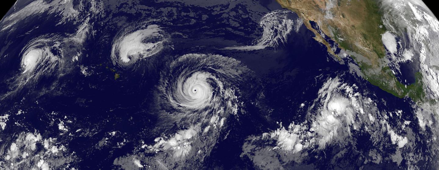 Four Tropical Cyclones Across the Entire Pacific Ocean