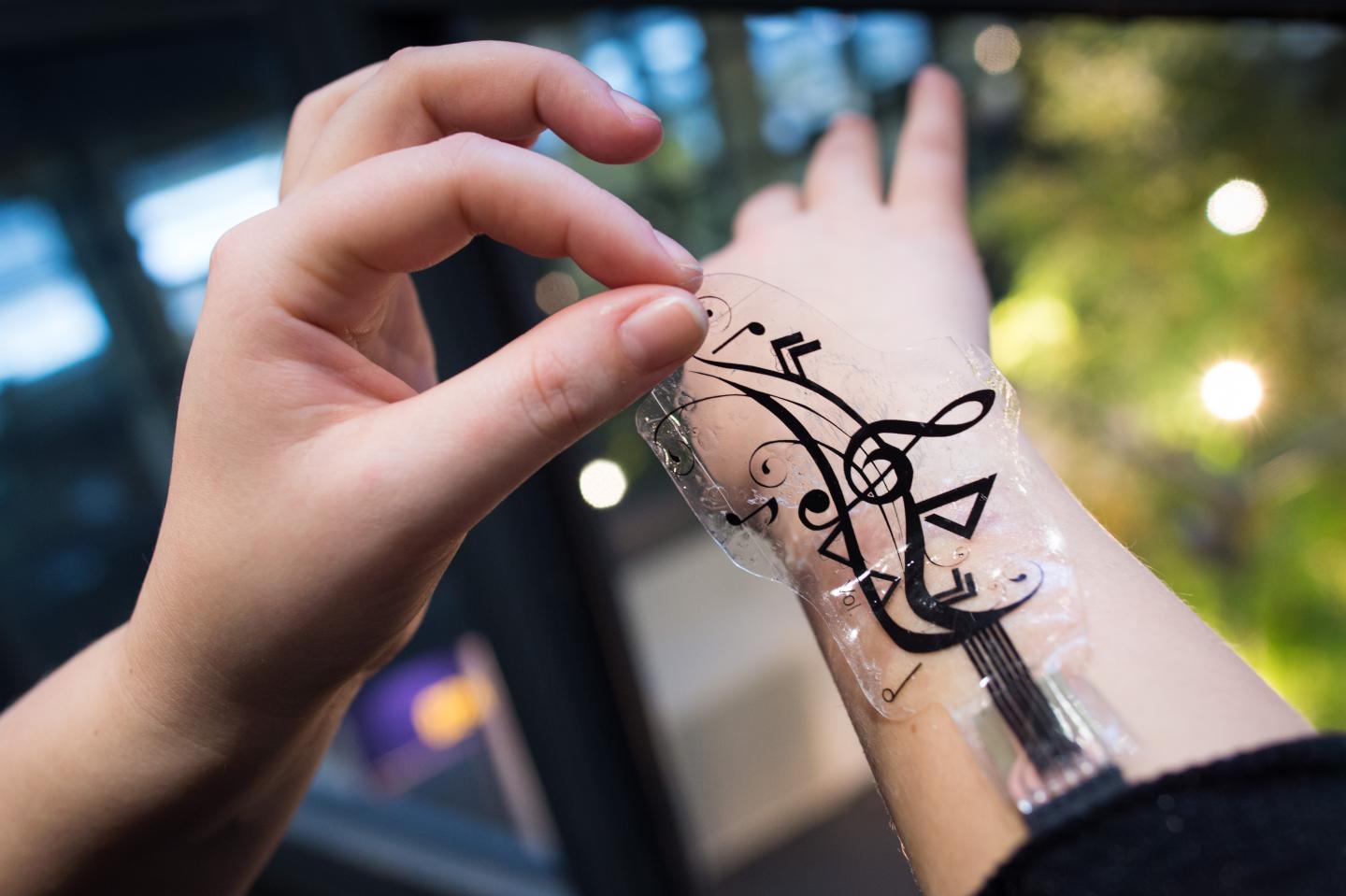 Flexible Sensors Turn Skin into a Touch-Sensitive Interaction Space for Mobile Devices (2 of 2)