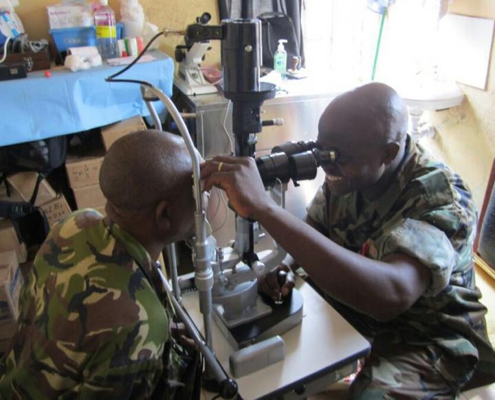 Ophthalmology Nurse Fayiah Momorie Trains with a New Slit Lamp in Military Hospital 34, Freetown, Si
