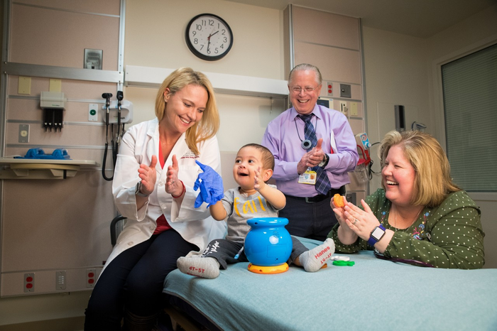 Dr. Ewelina Mamcarz of St. Jude with patient Samuel Evangelista