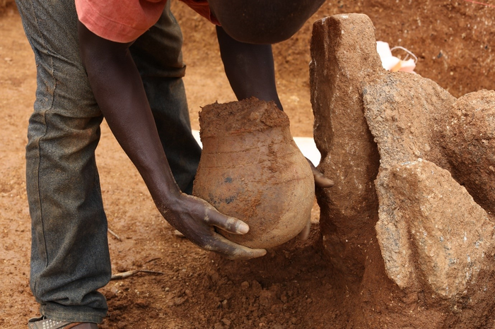 Excavating Nok terracotta pottery vessel at Ifana 3 site