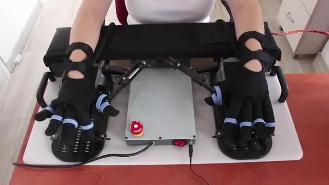 Special Gloves That Move Left Hand to Match Right Hand Movements