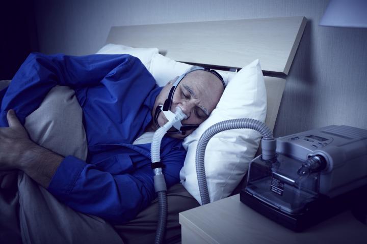 Man Using CPAP Therapy