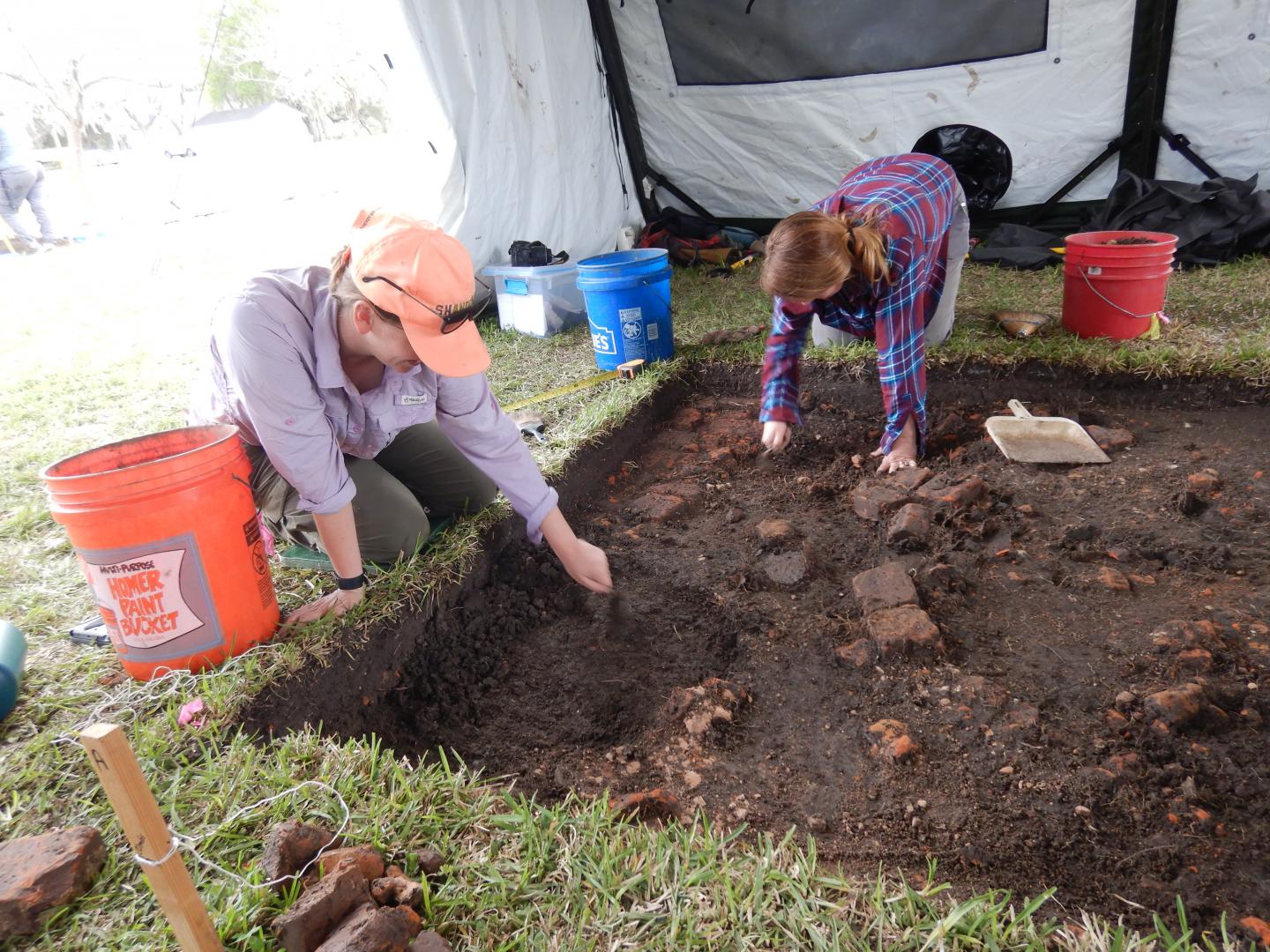 IMAGE 1 - Archaeologists doing fieldwork