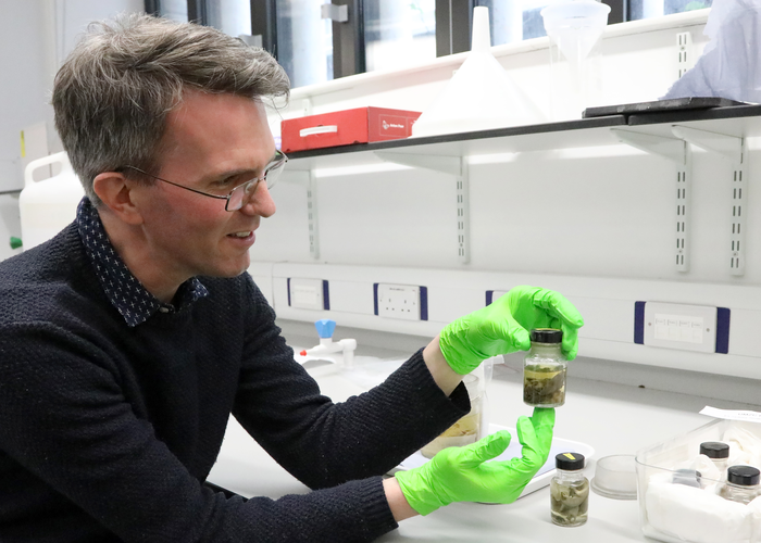 Jack holding specimen jar