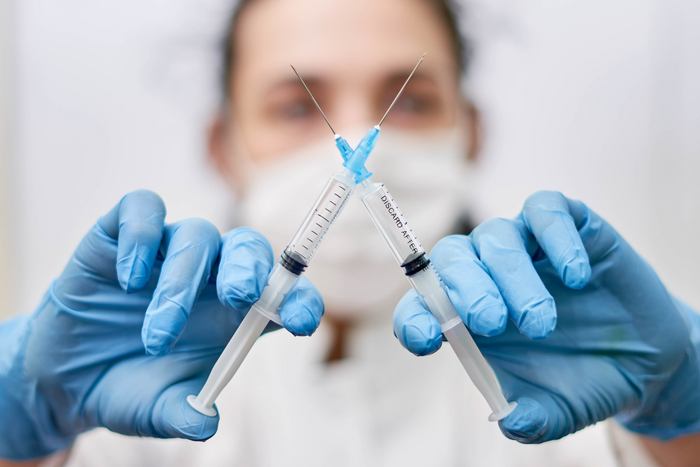 Two dose vaccine allocation strategies
