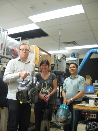 Researchers Holding Vacuums