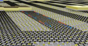 Graphene network (black atoms) on top of silicon carbide (yellow and white atoms)