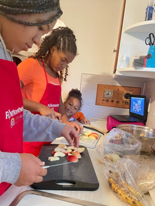 Flint Families Cook, co-facilitated by a chef and dietitian, encourages families to cook healthy meals together at home