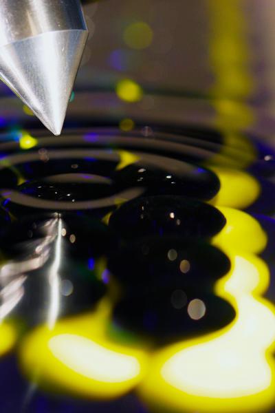 Oscillating Atomic Force Microscope Tip