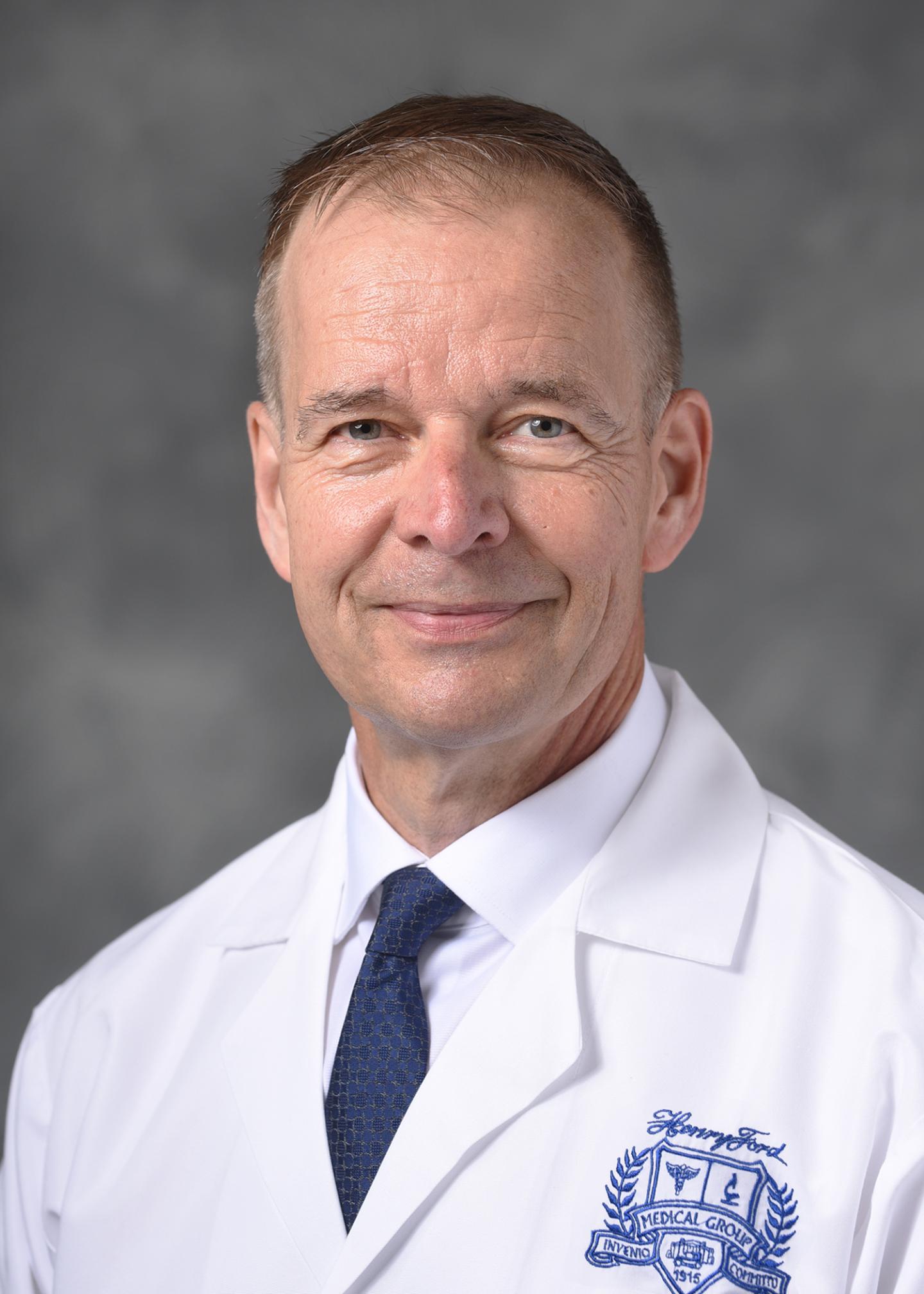 Tom Mikkelsen, M.D.