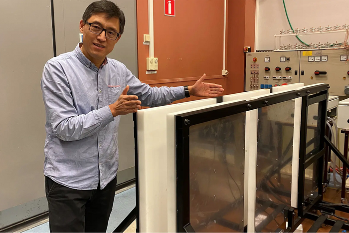 Professor Yujing Liu and the  system that enables charging of high-power electric ferries and vehicles.