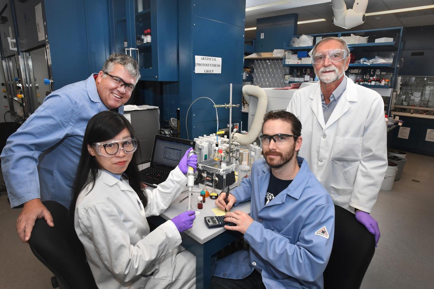 Javier Concepcion (standing, left) with Yan Xie, David Shaffer, and David Szalda
