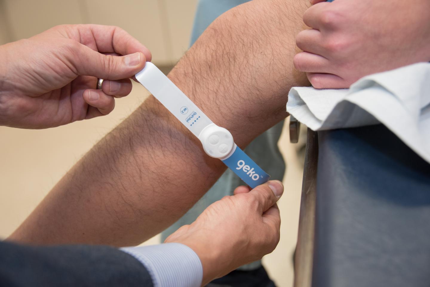 The geko&trade; device being applied to the leg