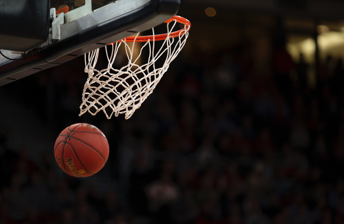 A basketball flying through the air.