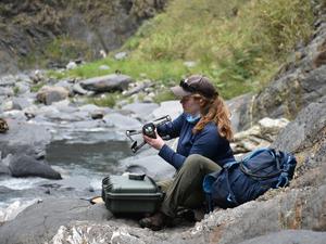 preparing a drone to survey a section of river channel