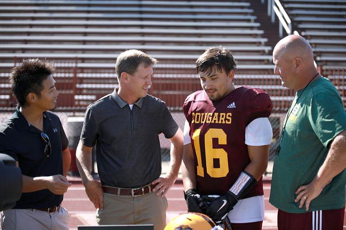 Kawata with football players