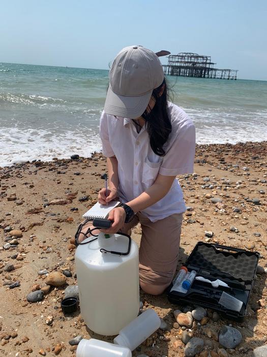 Researcher takes water samples