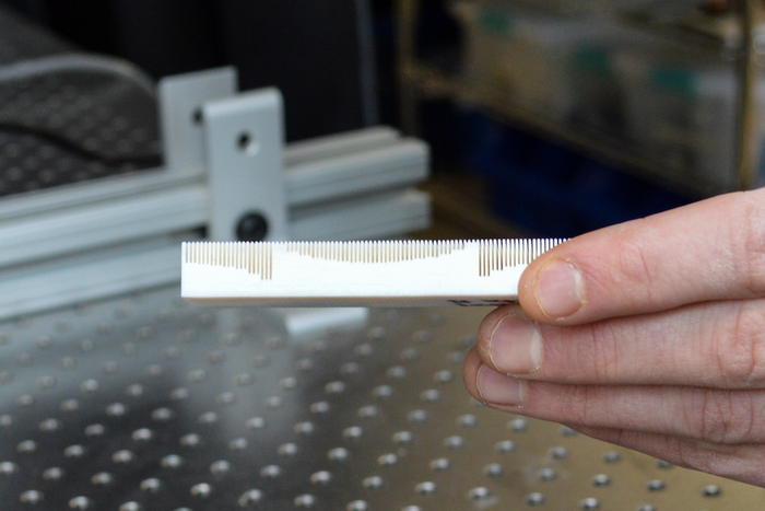 Material with metasurface