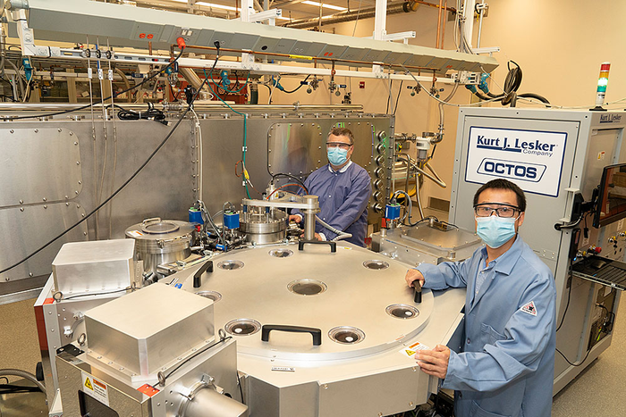 CFN staff with central Quantum Material Press (QPress) robot