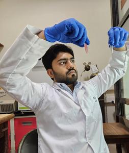 Avik Chattopadhyay working in the lab