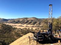 Scientific drill rig on hillslope