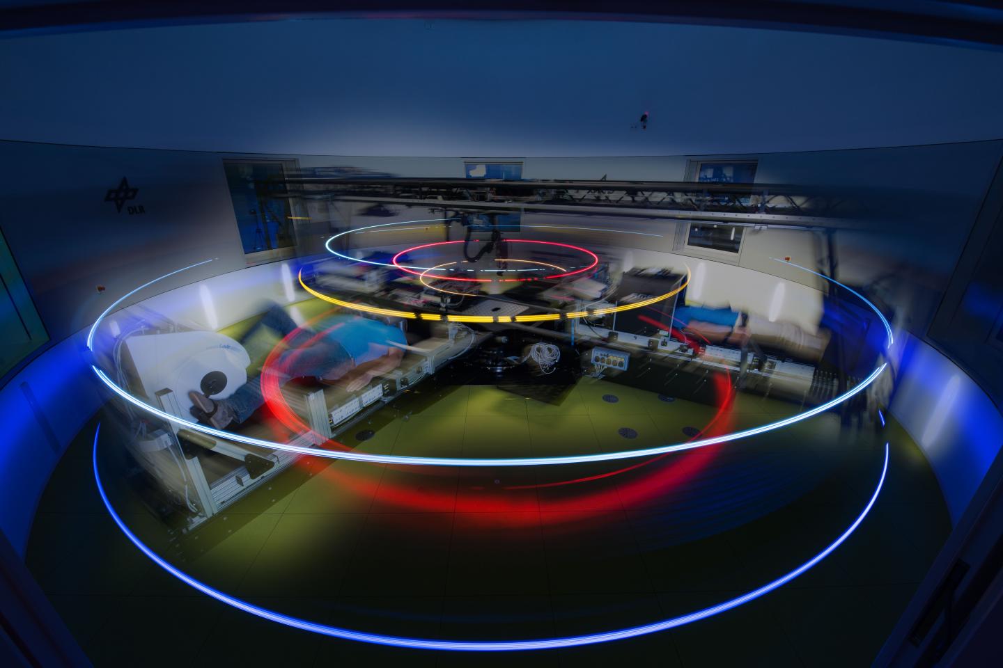 Long-exposure photo of the centrifuge used to simulate microgravity in the research subjects