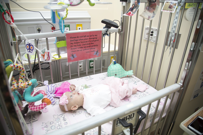 Baby with webcam over NICU bed